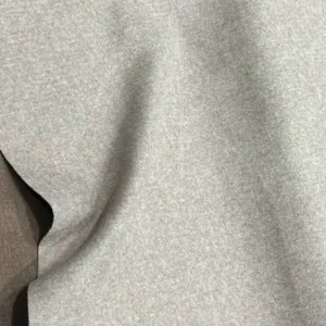 فوتر کوبیده پشت تریکو قهوه‌ای روشن